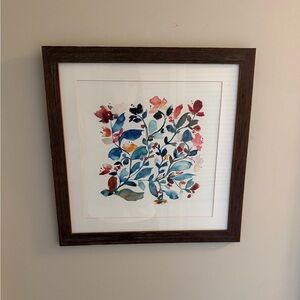 Framed and matted floral print.